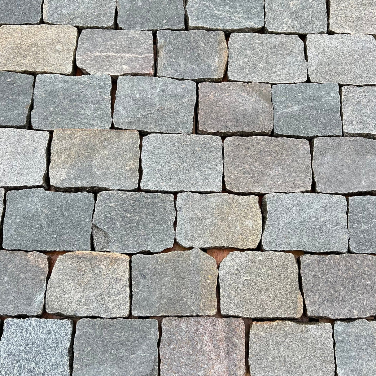 Reclaimed Smooth Granite Cobble Tops - Per SQM