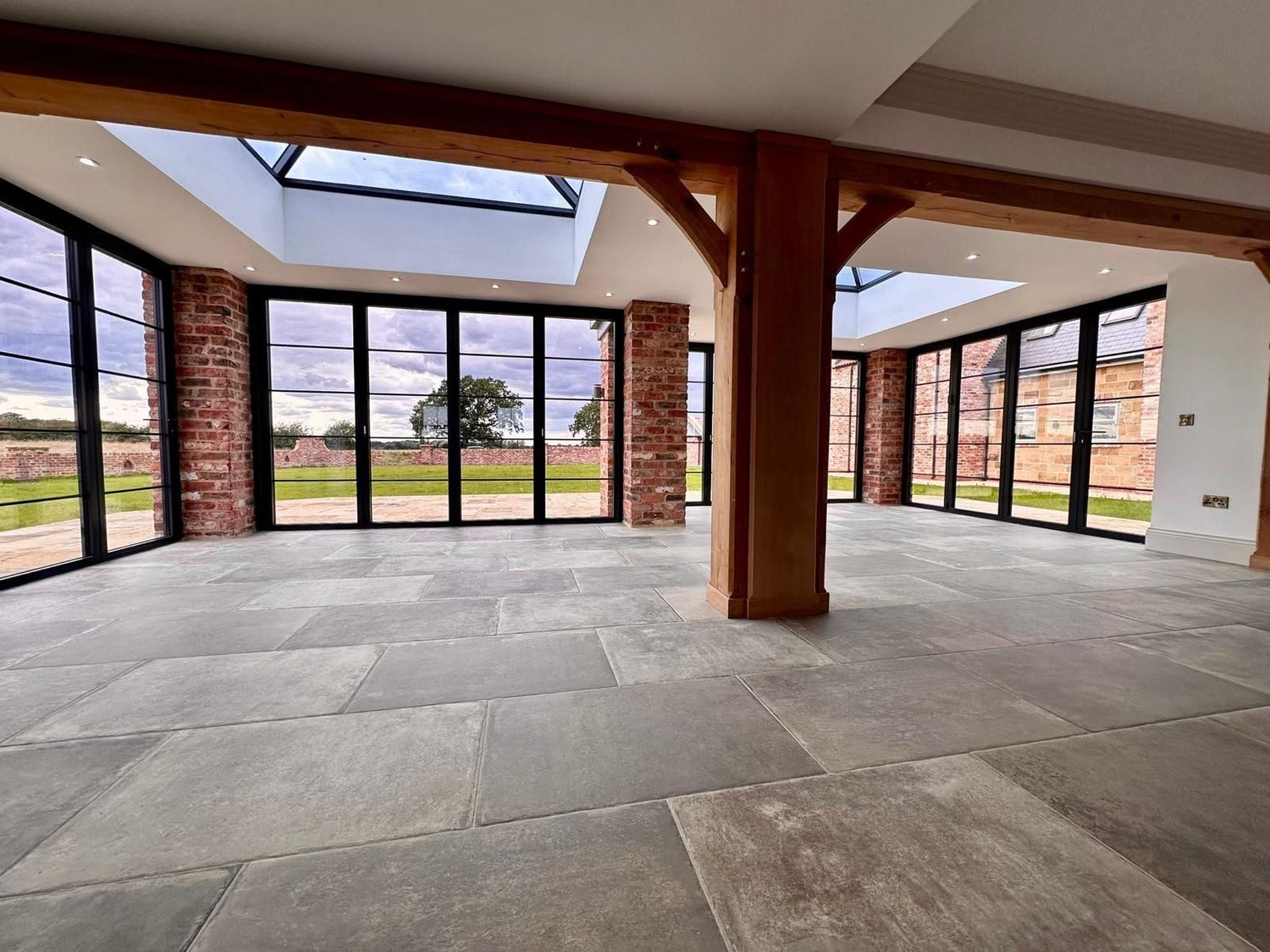 Modern Family Farmhouse Built Using Reclaimed Handmade Bricks
