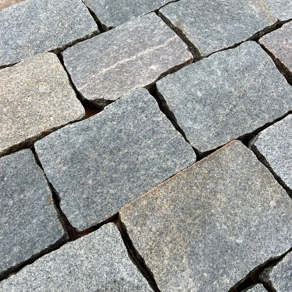Reclaimed Smooth Granite Cobble Tops - Per SQM