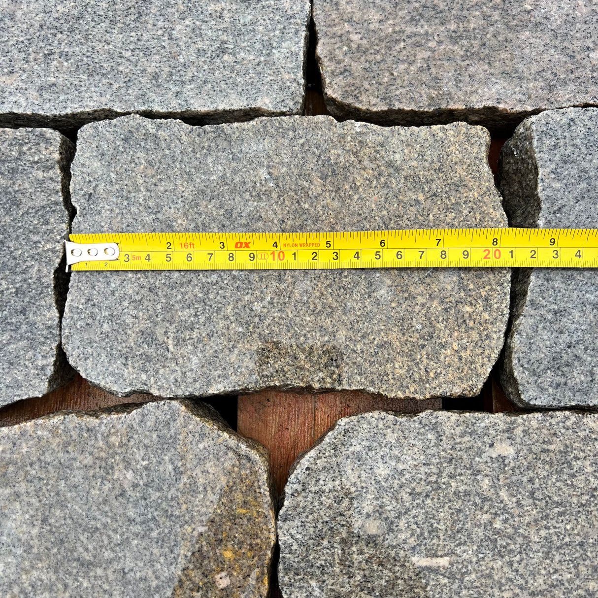 Reclaimed Smooth Granite Cobble Tops - Per SQM