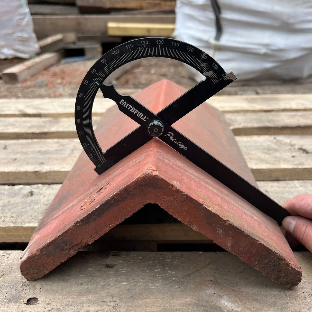 Reclaimed Red Triangle Roof Ridge Tile Cap End - 105 Degree
