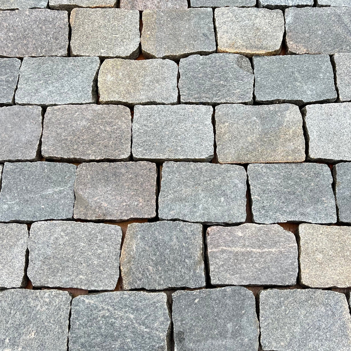 Reclaimed Smooth Granite Cobble Tops - Per SQM