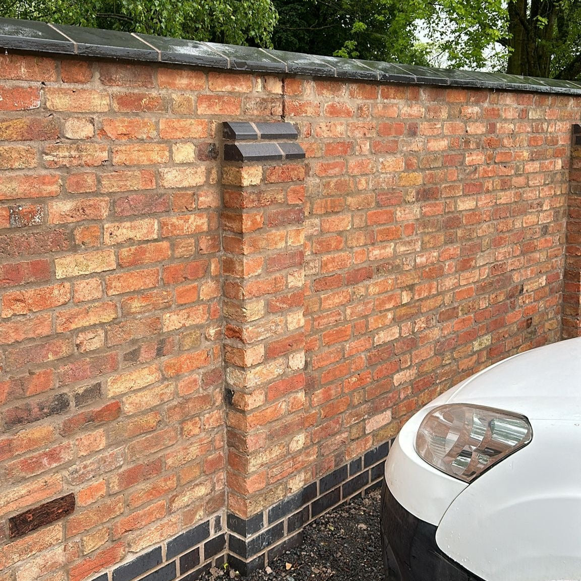 Garden Wall & Building Built Using Reclaimed Bricks in Coventry
