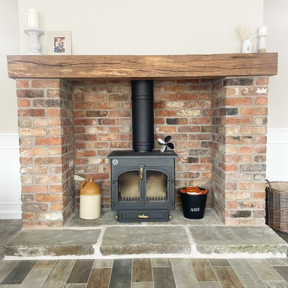 Brick Slip Fireplace with Oak Beam and Yorkshire Stone Hearth