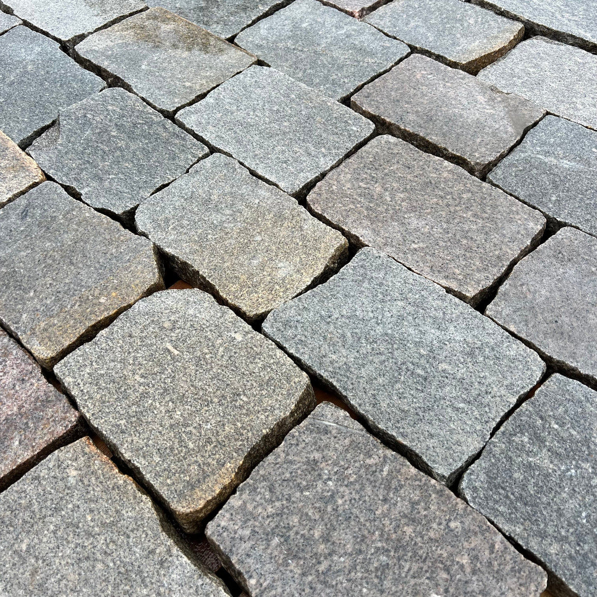 Reclaimed Smooth Granite Cobble Tops - Per SQM