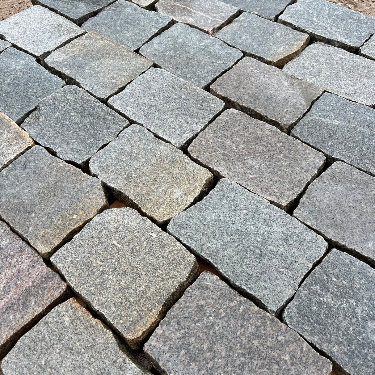 Reclaimed Smooth Granite Cobble Tops - Per SQM