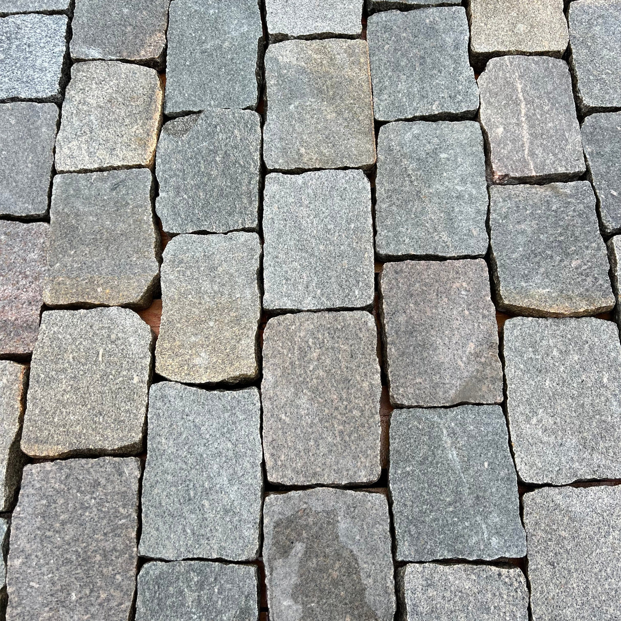 Reclaimed Smooth Granite Cobble Tops - Per SQM