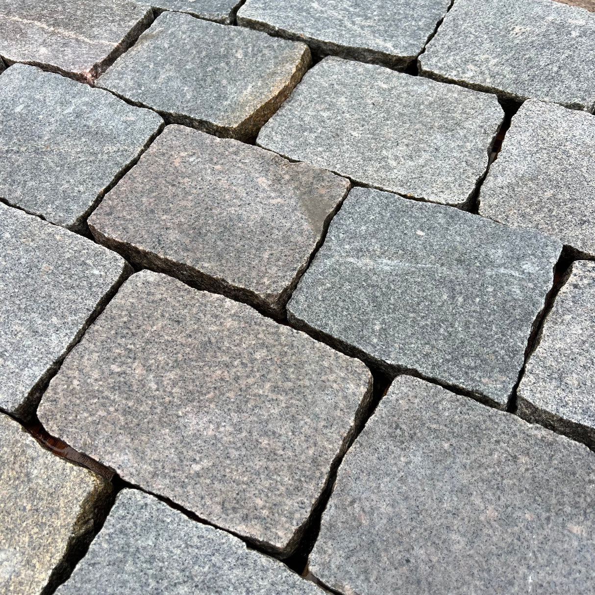 Reclaimed Smooth Granite Cobble Tops - Per SQM