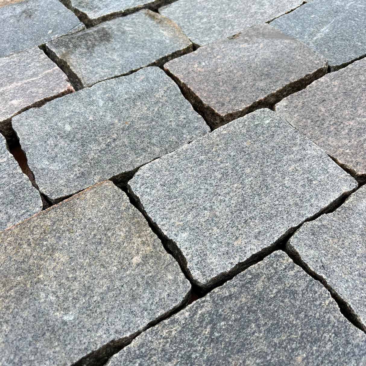 Reclaimed Smooth Granite Cobble Tops - Per SQM