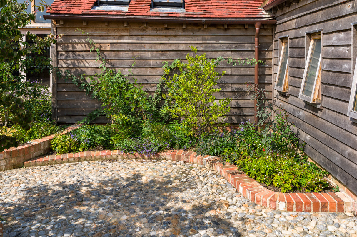 Farm Shop Outdoor Garden With Clay Brick Pathways