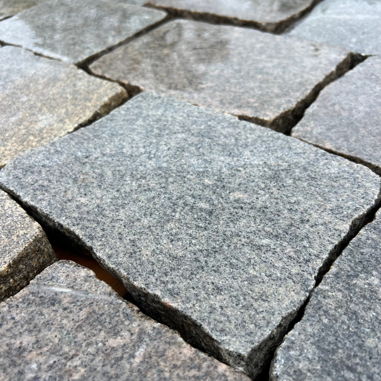 Reclaimed Smooth Granite Cobble Tops - Per SQM