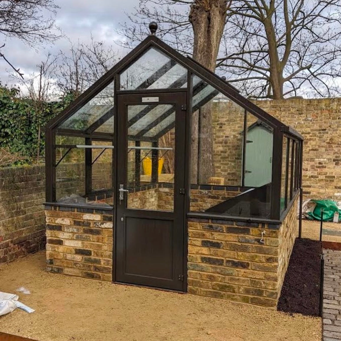 Reclaimed Brick Glass Green House Base in Cambridge