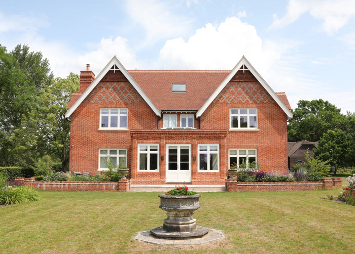 Reclaimed Brick House and Clay Tile Roof