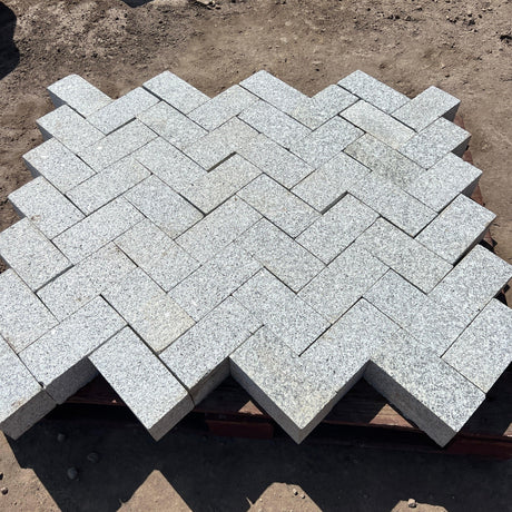 New Flamed Silver Granite Paving Cobble - Reclaimed Brick Company