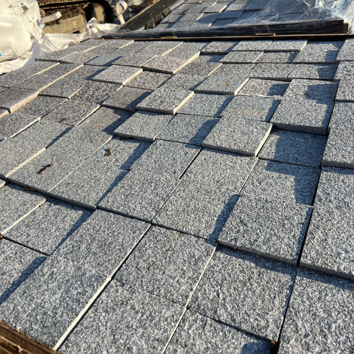 New Flamed Silver Granite Cobble Sett - Reclaimed Brick Company