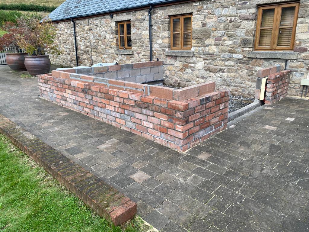 Reclaimed Common Brick Garden Wall and Fireplace - Reclaimed Brick Company