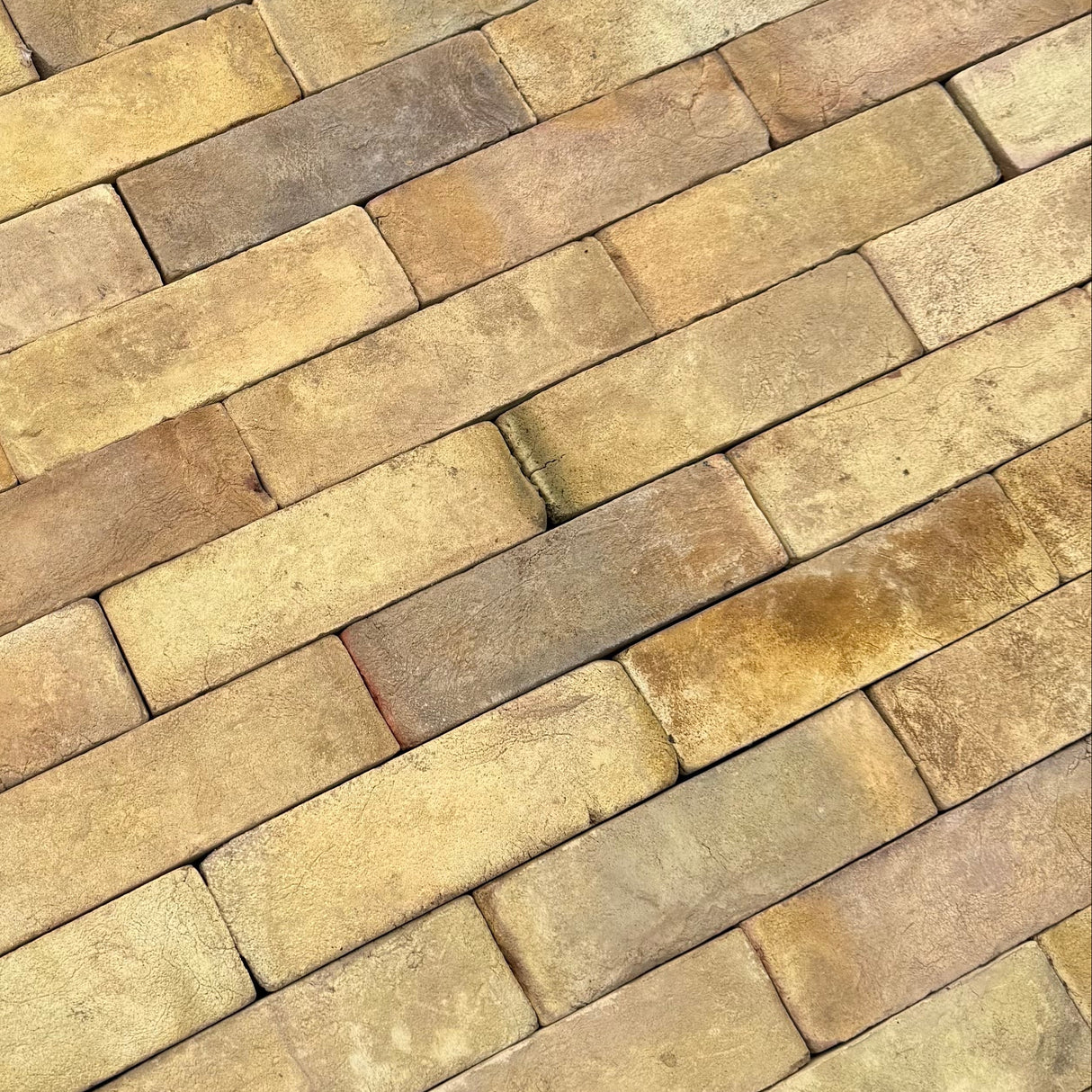 Brick pattern on a blue base with a natural stone background