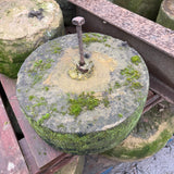 Reclaimed Mill Stone with Metal Bar