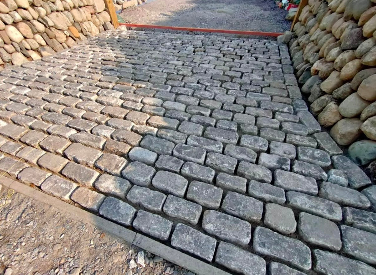 Reclaimed Elongated London Granite Cobble Setts - Bulk Bag
