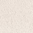 A close-up view of fresh natural lime mortar showing the texture and color.