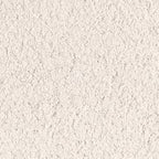 A close-up view of fresh natural lime mortar showing the texture and color.