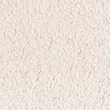 A close-up view of fresh natural lime mortar showing the texture and color.