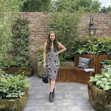 Visitor standing beside brick slip garden wall at RHS Chelsea Flower Show
