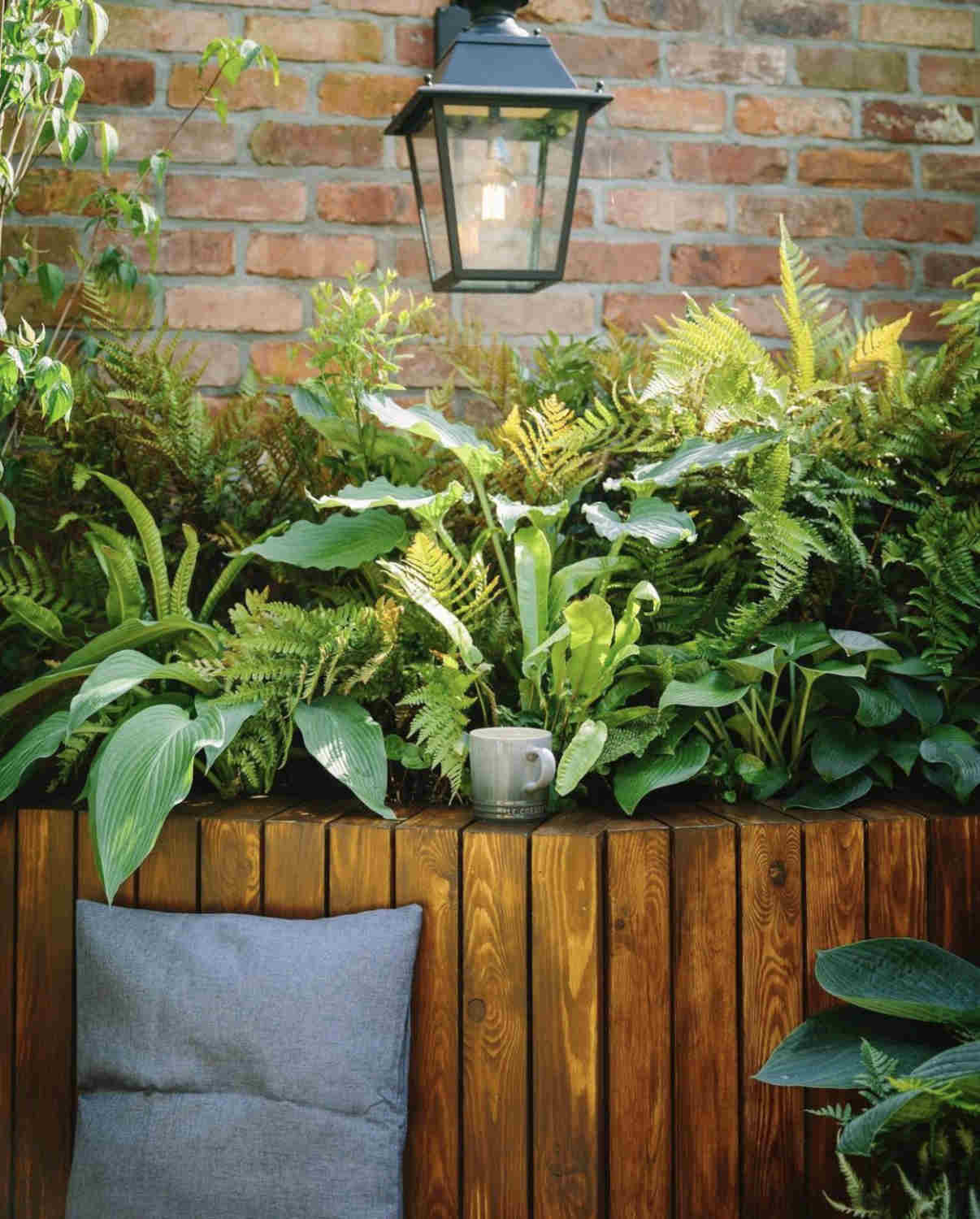 Close-up of reclaimed brick slip texture on outdoor garden wall