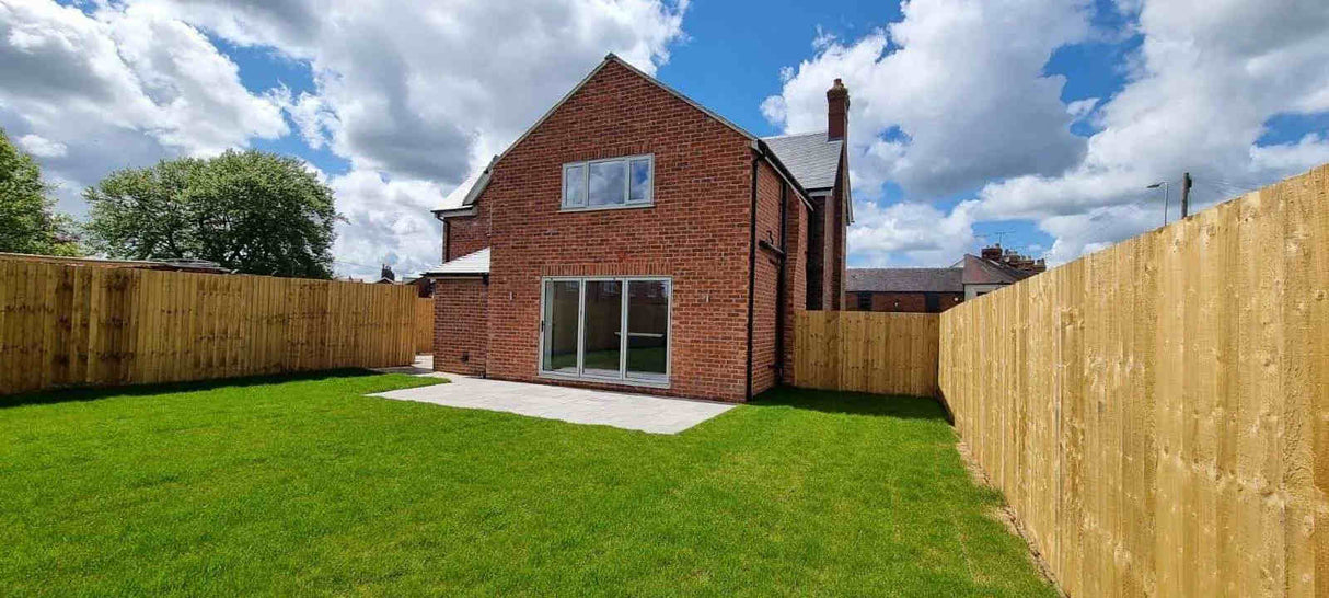 External brick slip cladding across rear of house showing finished elevation