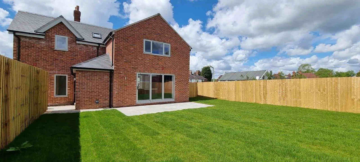 Rear view of house with external brick slip cladding from side angle