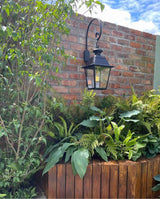 Outdoor garden wall built with reclaimed brick slips in show garden