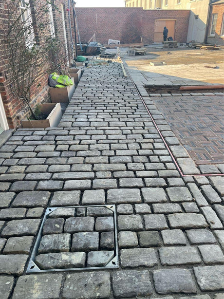 Court Yard using Reclaimed Gritstone Cobbles, Bristol - Reclaimed Brick Company