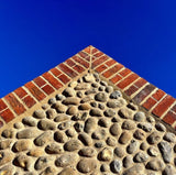 Flint stone walling and red brick