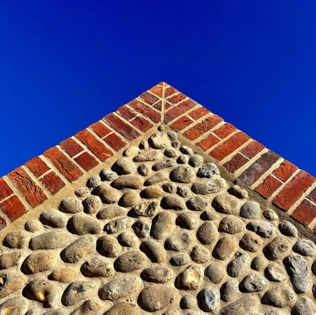 Flint stone walling and red brick