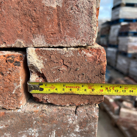 Red clay brick with a weathered and aged patina - Reclaimed Brick Company