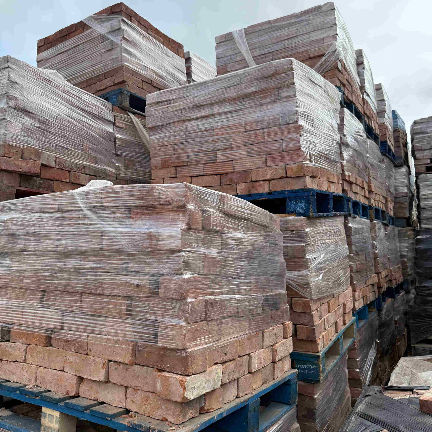 Reclaimed bricks on pallet, sustainable construction