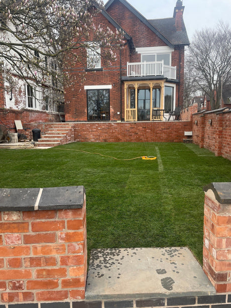 Reclaimed Cafferata Brick Garden Wall with Feature Blue Coping, Nottingham, Nottinghamshire - Reclaimed Brick Company